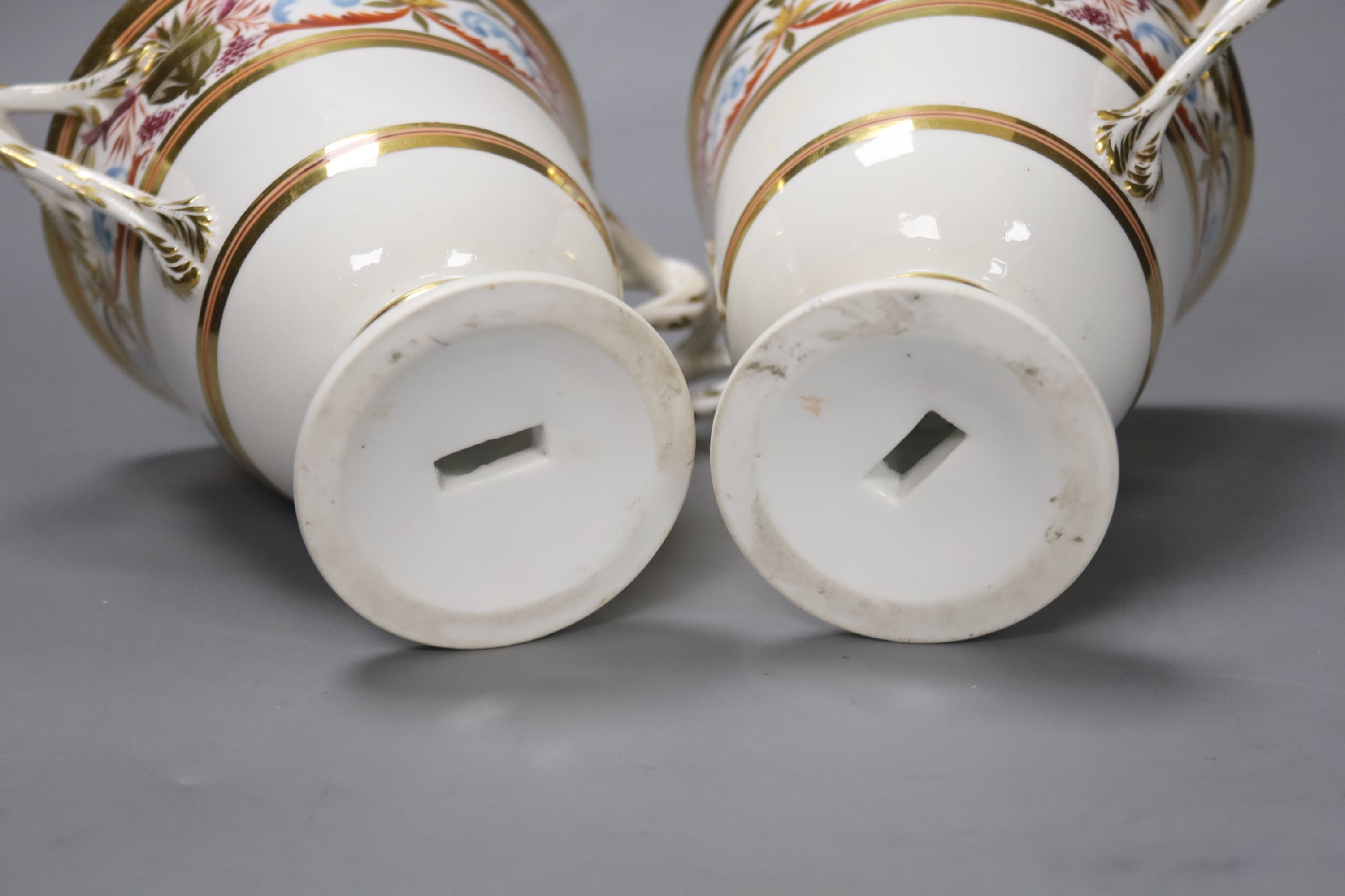 A pair of Derby two handled loving cups, c.1805, painted in arabesque style, pattern no.407, height 14cm